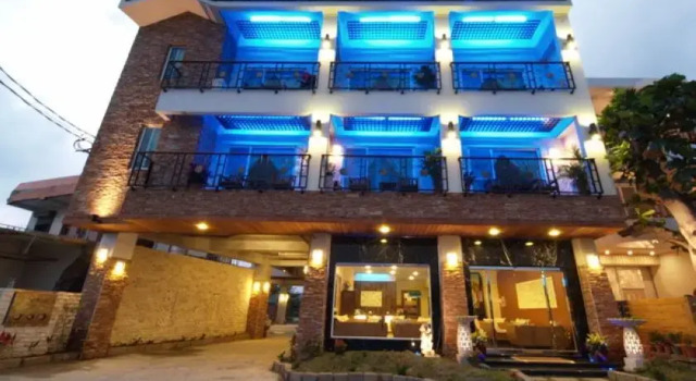Кровать в общем номере Seasons Bali Fashion Inn