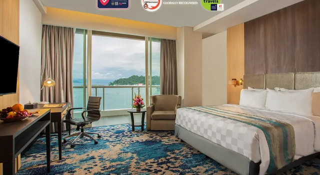 Кровать в общем номере Swiss-Belhotel Papua