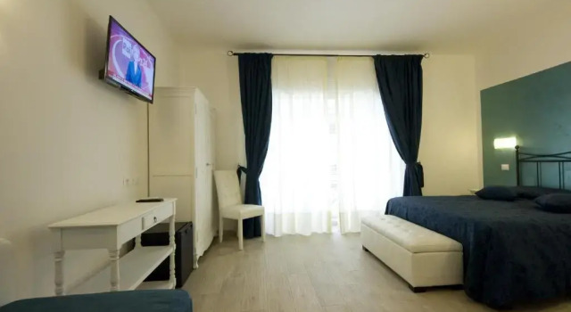 Четырёхместный номер Standard Atlantis Inn Roma