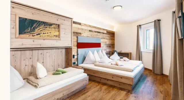Кровать в общем номере Landhaus Lindling