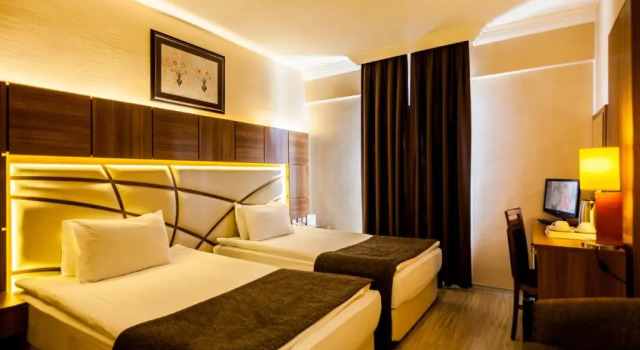 Трёхместный номер Rumi Hotel