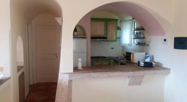 House with 3 bedrooms in Cannigione with wonderful sea view enclosed garden and WiFi 600 m from the beach, Book Hotel Cannigione Emerald Coast