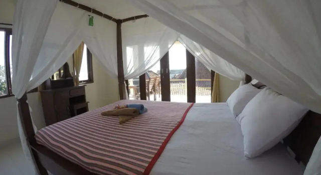 Двухместный номер Deluxe с балконом и с видом на море Homestay & Restaurant Segara Amed