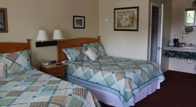 Whispering Firs Motel & RV Park, Réserver Motel Alger États-Unis