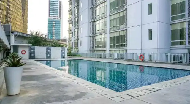 2BR Cozy at Empyreal Epicentrum Apartment By Travelio