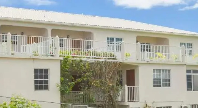 Апартаменты Caribbean Inn & Suites