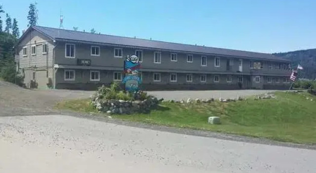 Кровать в общем номере Motel 8 Laramie
