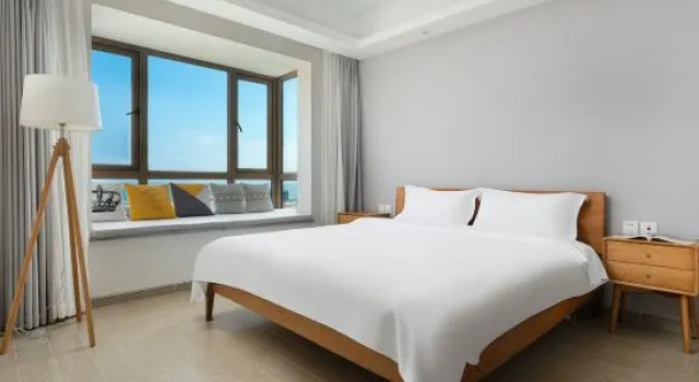 Люкс c 1 комнатой с балконом и с видом на море Chenxi Scenic Apartment (Shenzhou Peninsula)