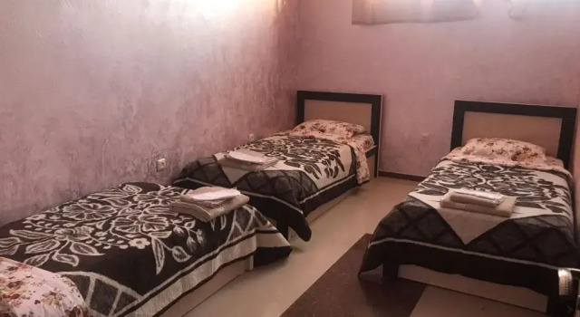 Кровать в общем номере Hotel Vakhtanguri