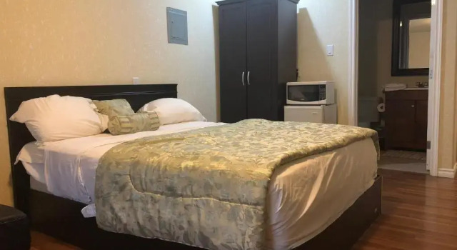 Люкс c 1 комнатой Langham Motel