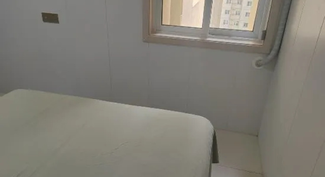 Кровать в общем номере Ruiyu Guesthouse
