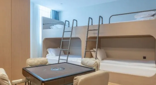 Кровать в общем номере Memory Shiguang E-sports Hotel (Nanchang Wangfujing Branch)