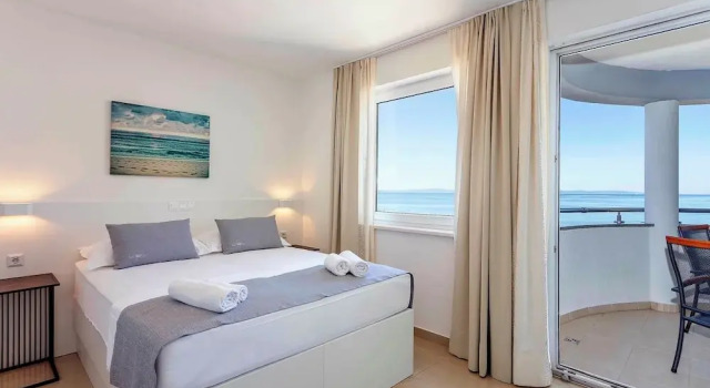 4 người Tiêu chuẩn phòng có ban công và có view biển Sunset Split Rooms