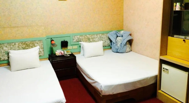 Camera quadrupla Standard Kai Cheng Inn 旅館134
