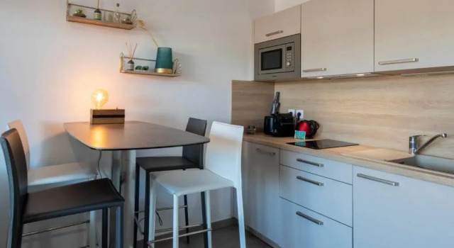 Студия Deluxe 06G - Superbe studio climatisé les pieds dans l'eau - piscine rooftop - parking privé