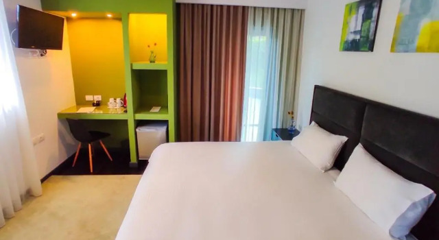 Номер Deluxe Dims Hotel & Restaurant