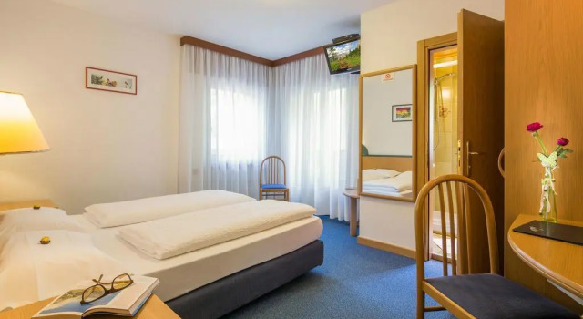 Hotel Garnì Ai Serrai, Забронировать Отель Рокка-Пьеторе Чиветта