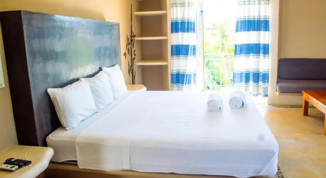 Четырёхместный номер Deluxe Отель OM Huatulco