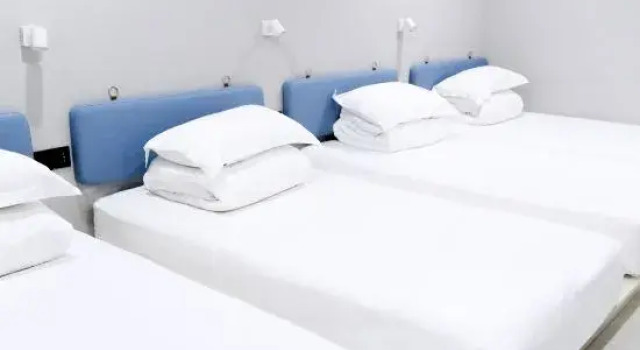 Кровать в общем номере WanYoo Esports Hotel (Shanghai Hongqiao Wuzhong Road)