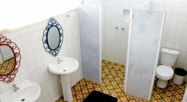 Кровать в общем номере с балконом Hostel Poesia