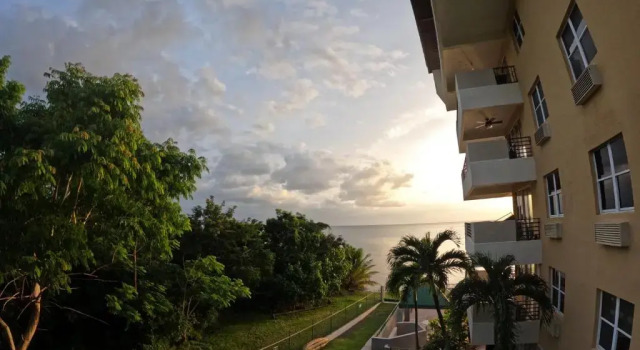 Апартаменты In Joyuda Beach, Apartment with Pool & Basketball Court