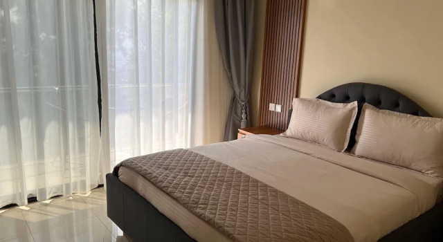 Q-Plus Apartments