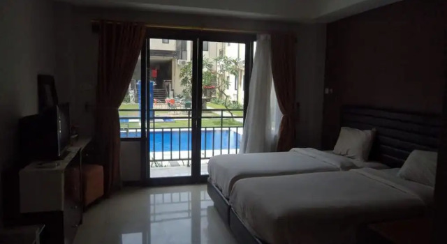 Студия с балконом The Aromas of Bali Hotel & Residence
