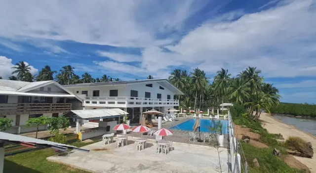 Кровать в общем номере Chilly Beach Resort Palawan