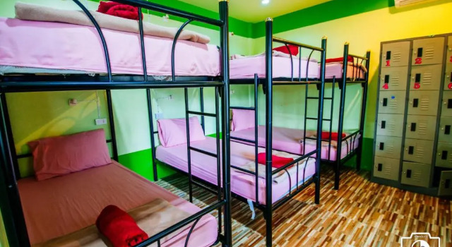 Кровать в общем номере Venus Resort