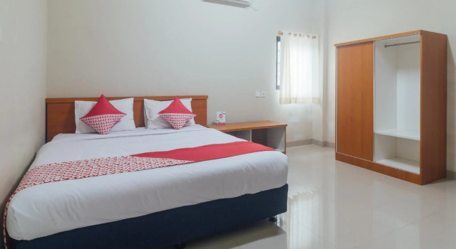 OYO 1448 Mangga Dua Guest House, Rezervovat Penzión Hotely v Maluku s parkováním, Parkování
