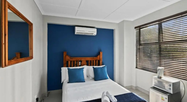 Luxo quarto De Akker Guest House