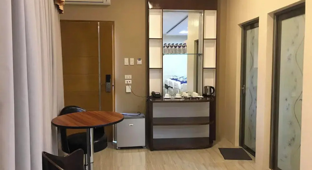 Кровать в общем номере NutriTECH Hotel and Events