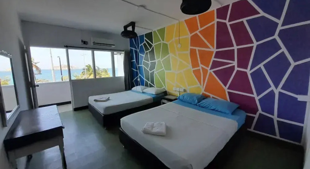 Standard quadruple chambre avec balcon et Vue mer Panamerican Hostel