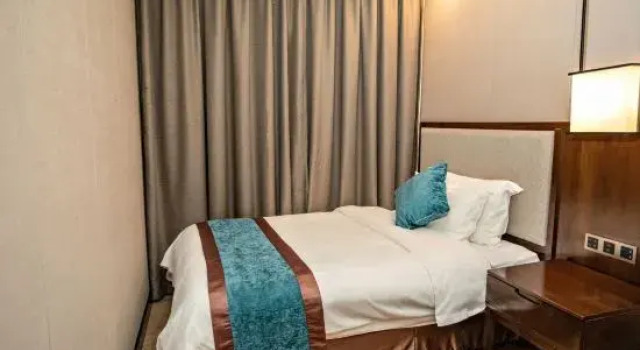 Семейный люкс BiYang ShangDongZunYue International Hotel