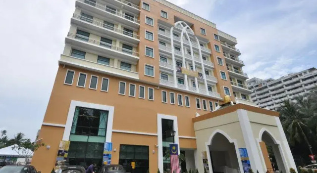 Кровать в общем номере Puteri Bay Hotel