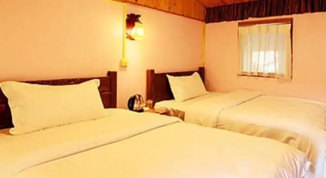 Lijiang Mengzhiju Hotel, Забронировать Отель Лицзян Юньнань, рядом с Улица Сквер-стрит Древнего города Даянь