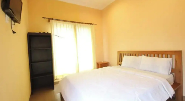 Номер Deluxe Capital O 94011 Binhari Guest House