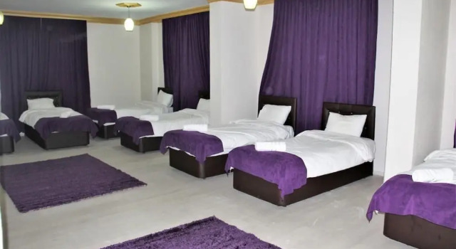 Кровать в общем номере Mitani Pension Hostel