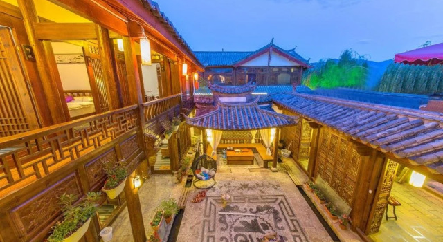 Xi Cheng Impression Hostel, Забронировать Хостел Отели Лицзян с парковкой, рядом с Zhongyi Market, Парковка