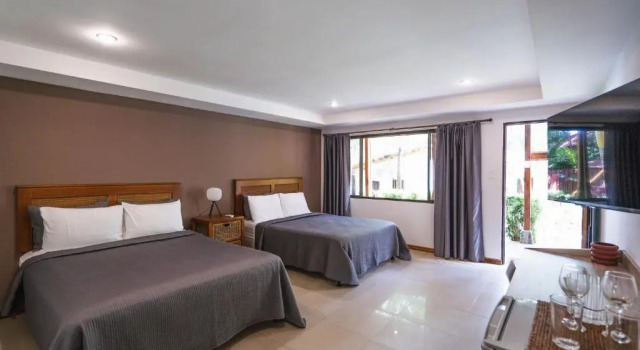 Четырёхместный номер Deluxe Hotel Arco Iris