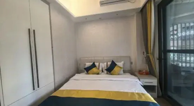 Семейный люкс с 2 комнатами Sanya Jingguan Hotel Apartment (Sanya Bay Coconut Dream Corridor Store)