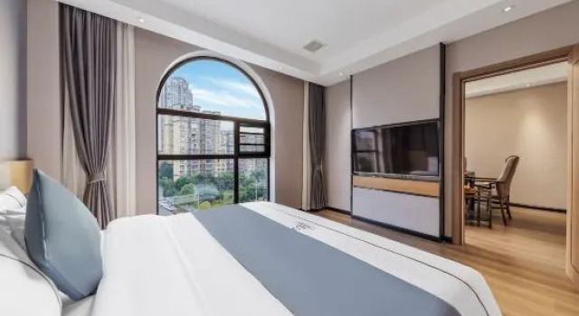 Люкс Ziyueqi Light Luxury Hotel (Meishan East Station Wanda Plaza)