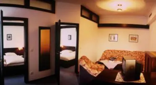 Четырёхместный номер Superior Hotel Goldener Hirsch