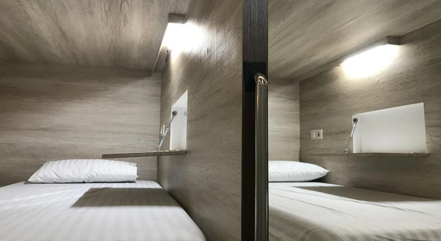 Кровать в общем номере The Colour Hostel