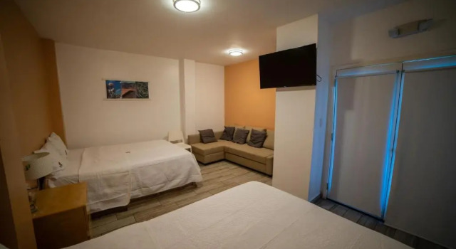 Четырёхместный номер Deluxe California Comfort & Suites