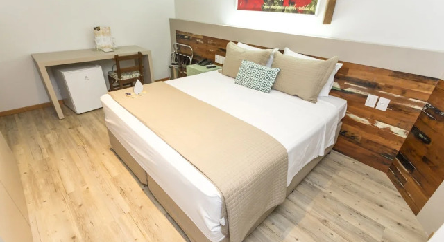 Кровать в общем номере Hotel Pousada do Bosque