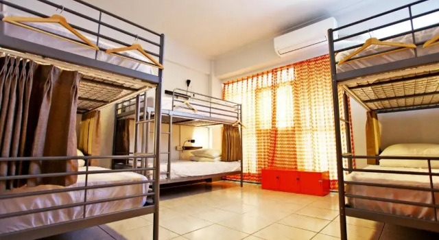 Кровать в общем номере Navel Orange Hostel