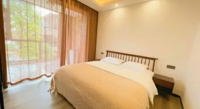 Семейный люкс с 2 комнатами Qiuhai Hanshe Homestay