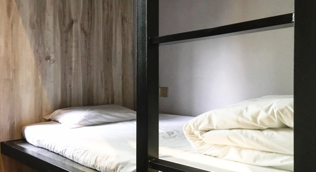 Cama em dormitório Lucky One Hostel