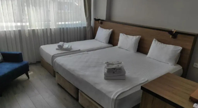 Трёхместный номер Standard Comfort Center Suit Hotel